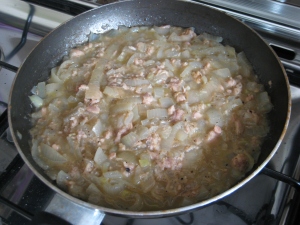 cooked tuna and onions in a pan